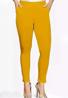 Fabulous  Yellow Cotton Solid Leggings For Women