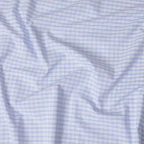 White Premium 100% cotton shirting fabric with turquoise baby blue print in checks design-D16844